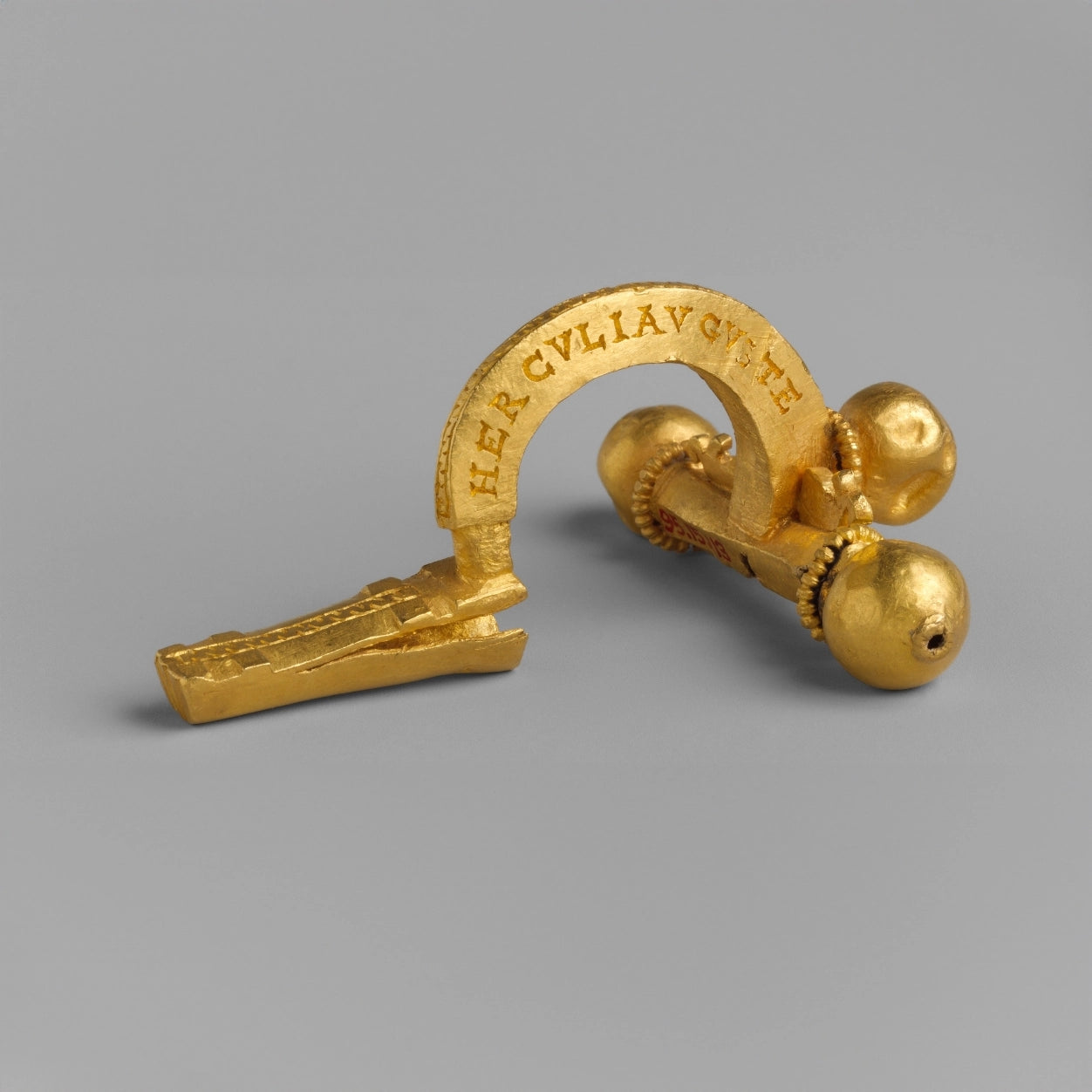 Crossbow fibula. Military insignia. Roman 286CE-305CE. Gold and silver. Met Museum.