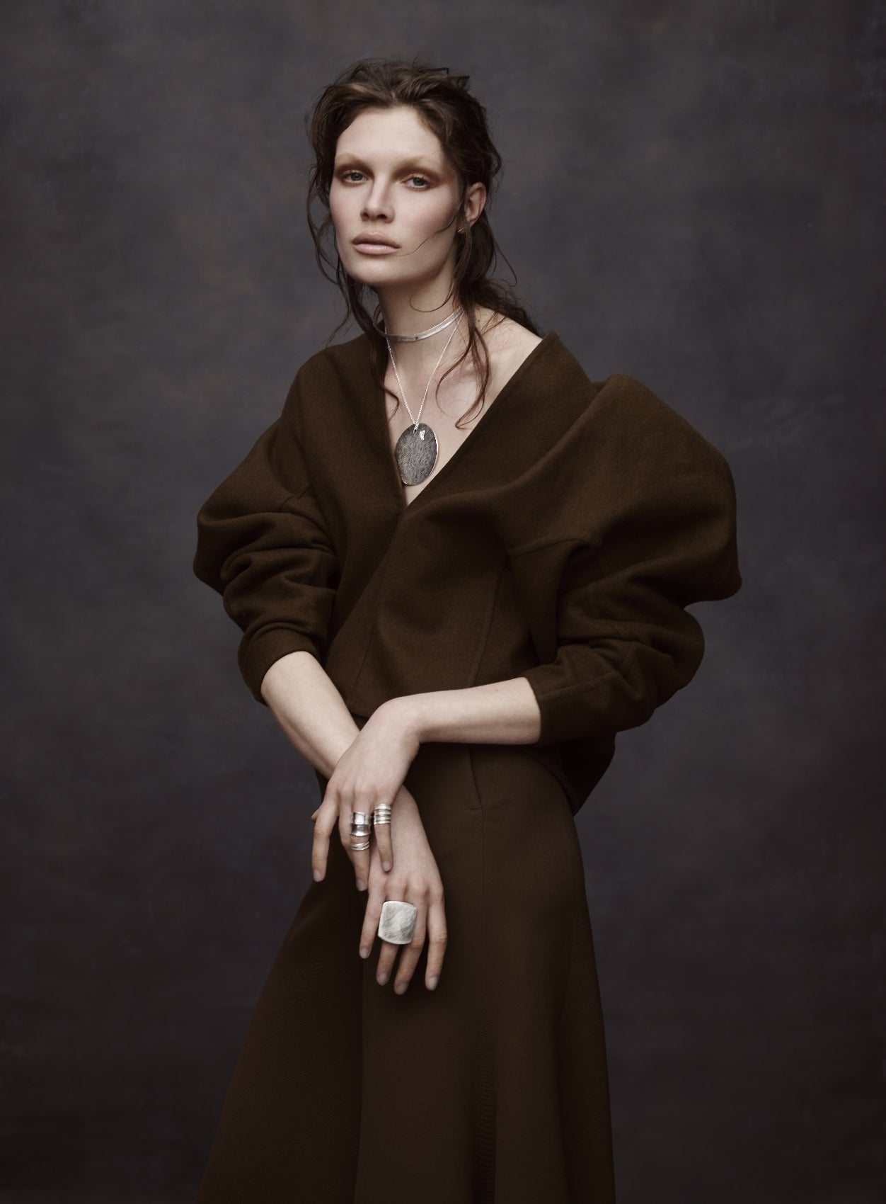 Photograph by Damian Foxe. A Lady wearing Wright & Teague Jewellery.