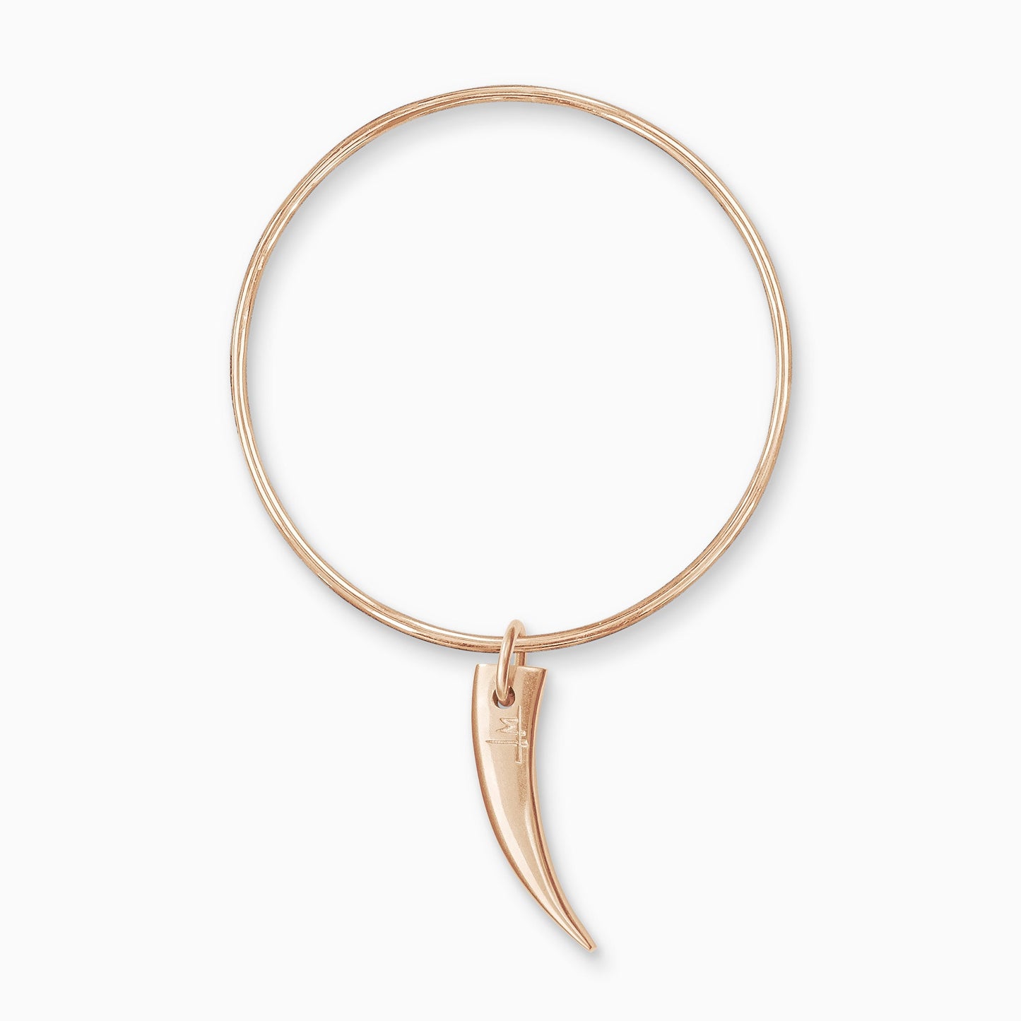 An 18ct Fairtrade rose gold smooth, tusk shaped charm, freely moving on a round wire bangle.  Charm 63mm. Bangle 63mm inside diameter x 2mm round wire.