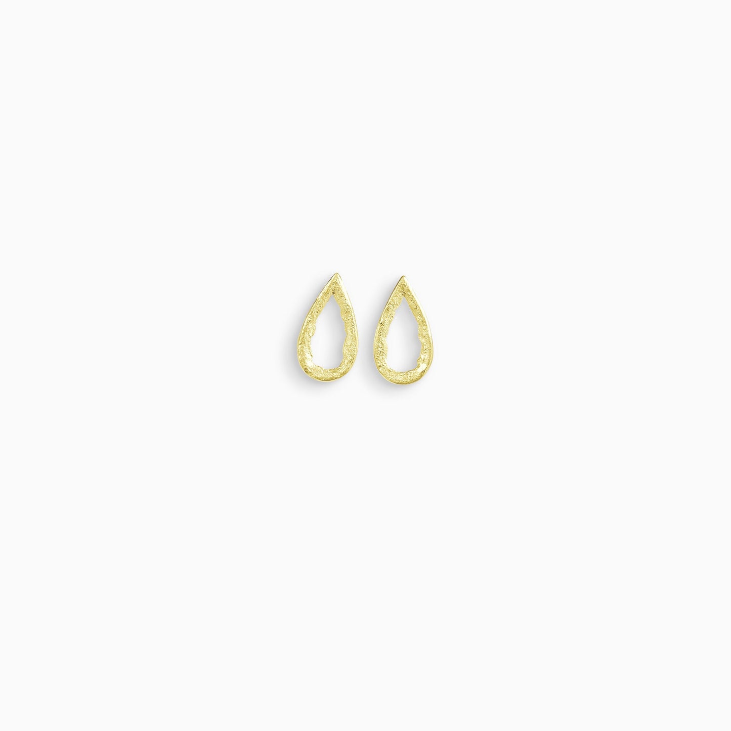 A pair of 18ct Fairtrade yellow gold stud earrings, teardrop in form with an open centre. Strong organic texture. Smooth outside edge, fragmented inside edges. 19mm x 10mm 