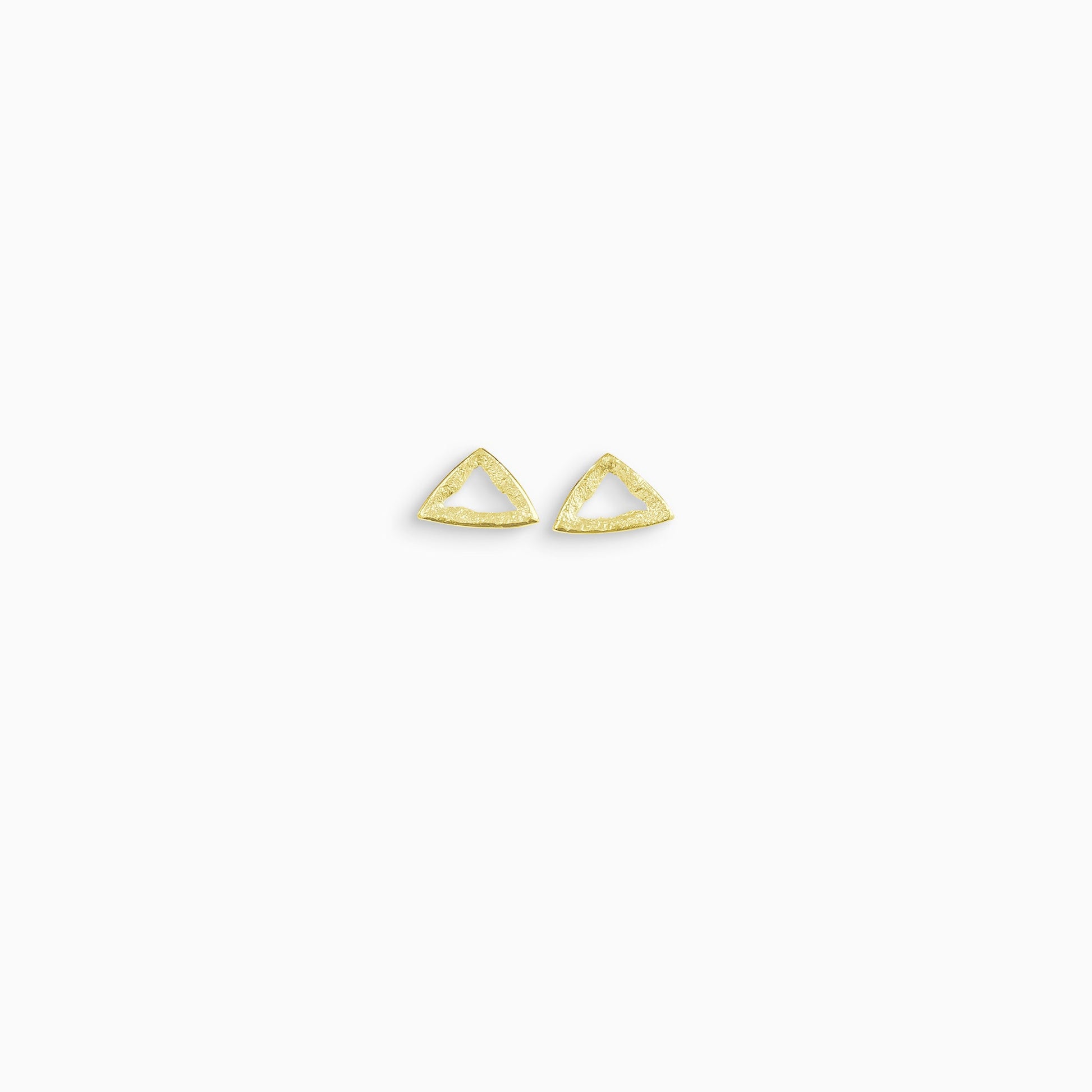 A pair of 18ct Fairtrade yellow gold stud earrings, triangular in form with an open centre. Strong organic texture. Smooth outside edge, fragmented inside edges. 14mm x 14mm x14mm 