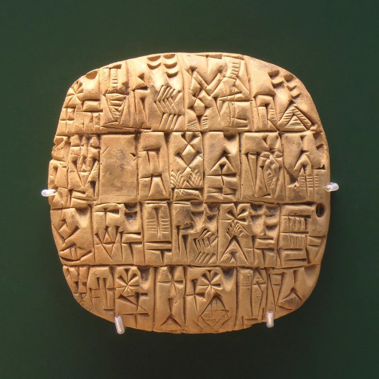 Early Sumerian, c. 2,500 BC tablet. The Cuneiform text details accounts of a governor’s silver.