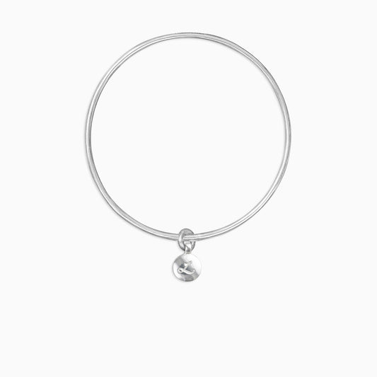 A recycled Silver round, smooth charm engraved with a single letter, choose from A-Z, freely moving on a round wire bangle. Charm 13mm diameter. Bangle 63mm inside diameter x 2mm round wire.