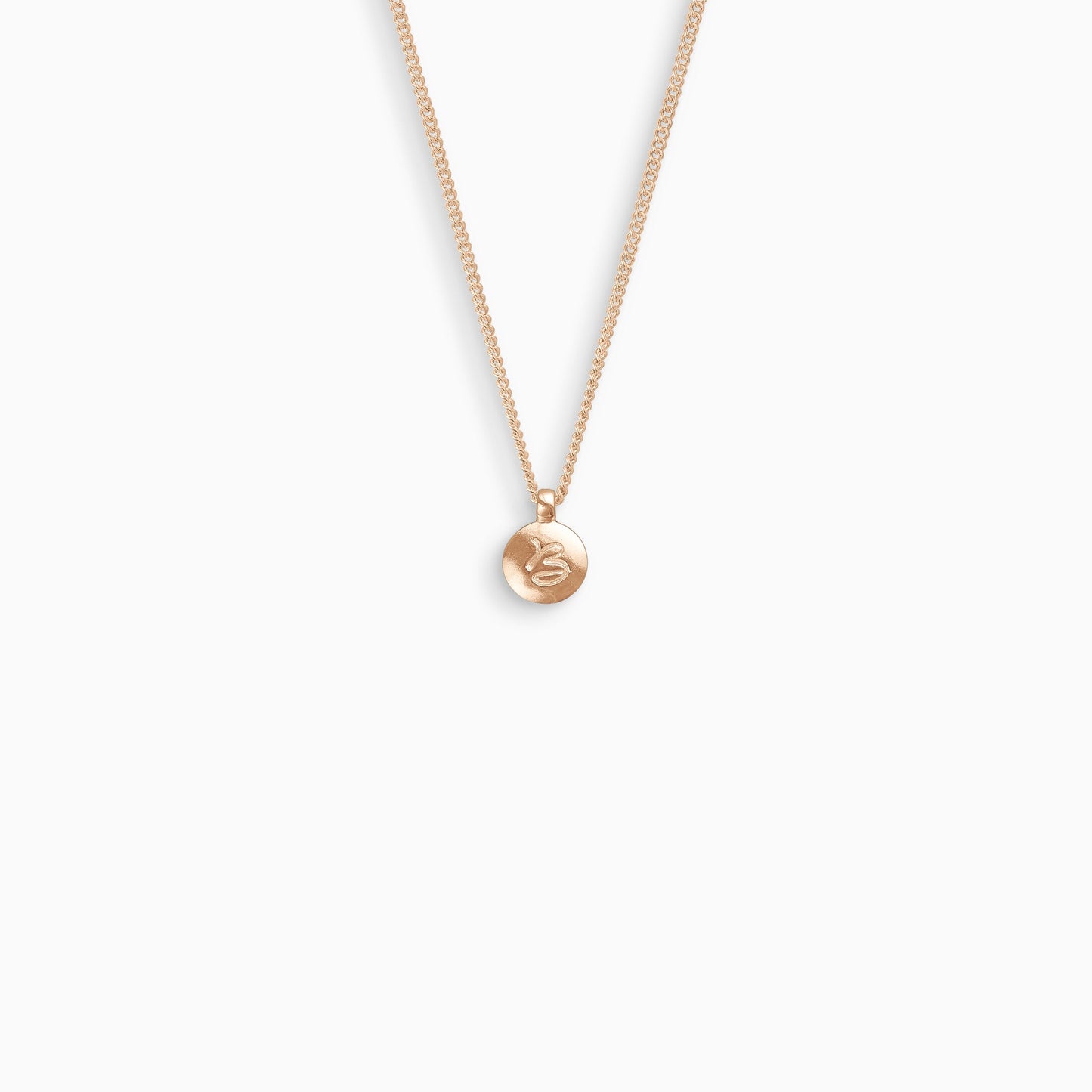 18ct Fairtrade rose gold 13mm round smooth convex pendant inscribed with a single letter of your choice from A-Z. On a 45cm curb chain.