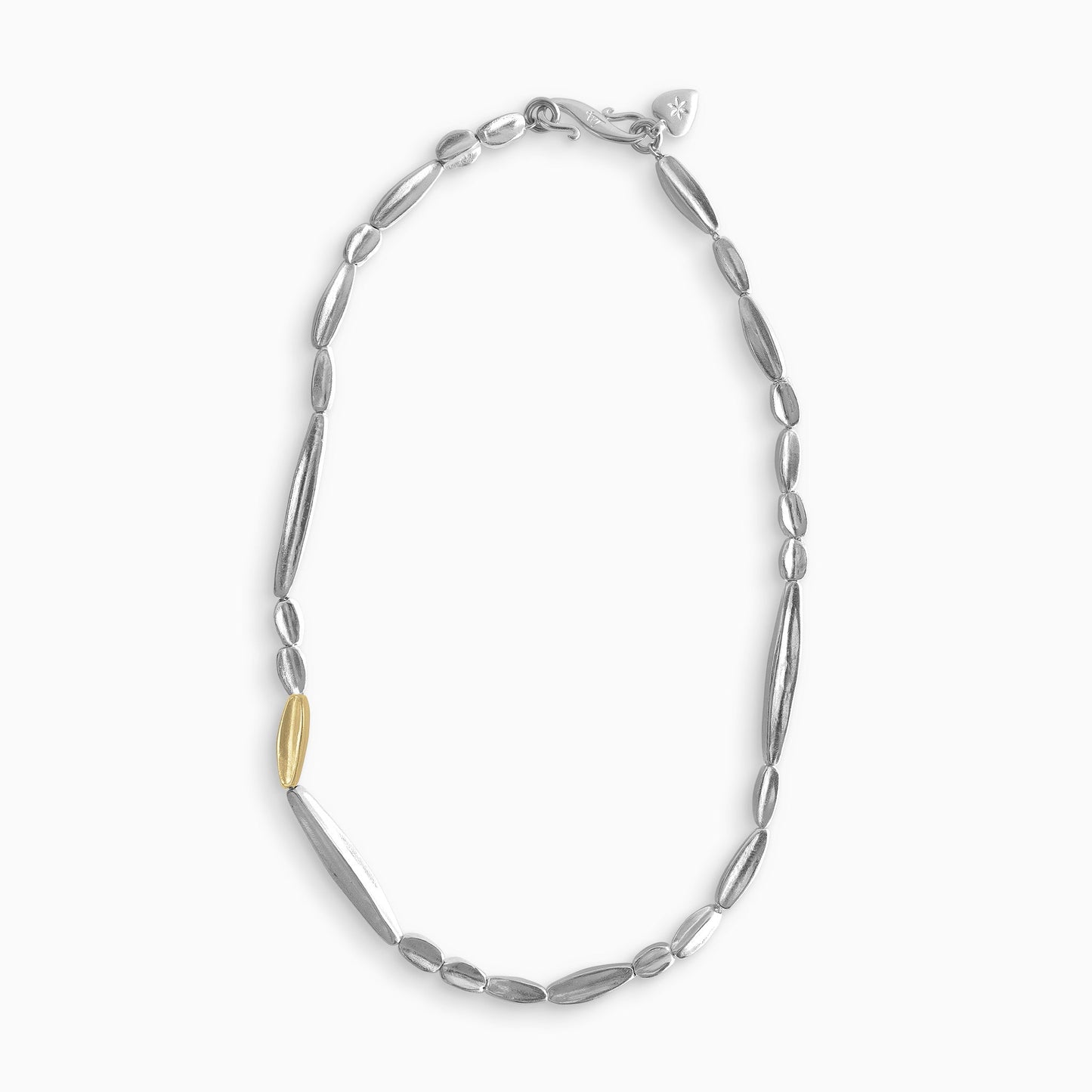 A necklace of recycled Silver handmade solid beads with an accent of a single 18ct Fairtrade yellow gold bead. Beads are varying lengths randomly arranged, The length of the necklace is 45cm. Each bead is tapered at the ends, concave and square in section, gently organic with a strong weight. Beads are approximately from 10mm to 29mm in length, 5mm square at the centres and 2mm square at the tapered ends.