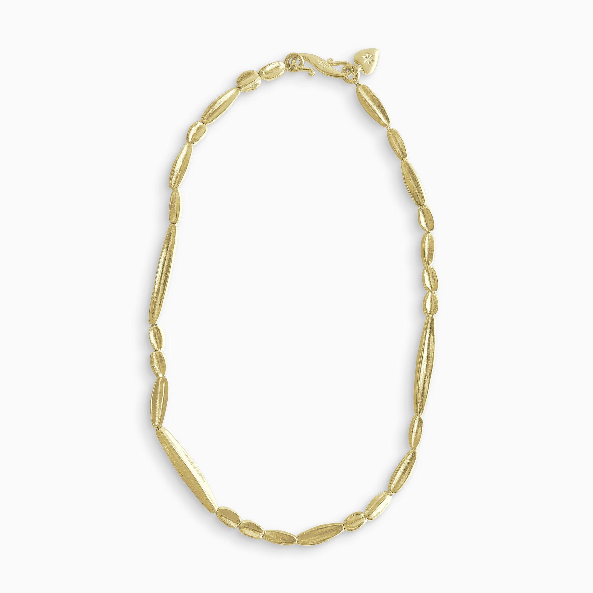 A necklace of 18ct Fairtrade yellow gold handmade solid beads, varying lengths randomly arranged, The length of the necklace is 45cm. Each bead is tapered at the ends, concave and square in section, gently organic with a strong weight. Beads are approximately from.10mm to 29mm in length, 5mm square at the centres and 2mm square at the tapered ends.