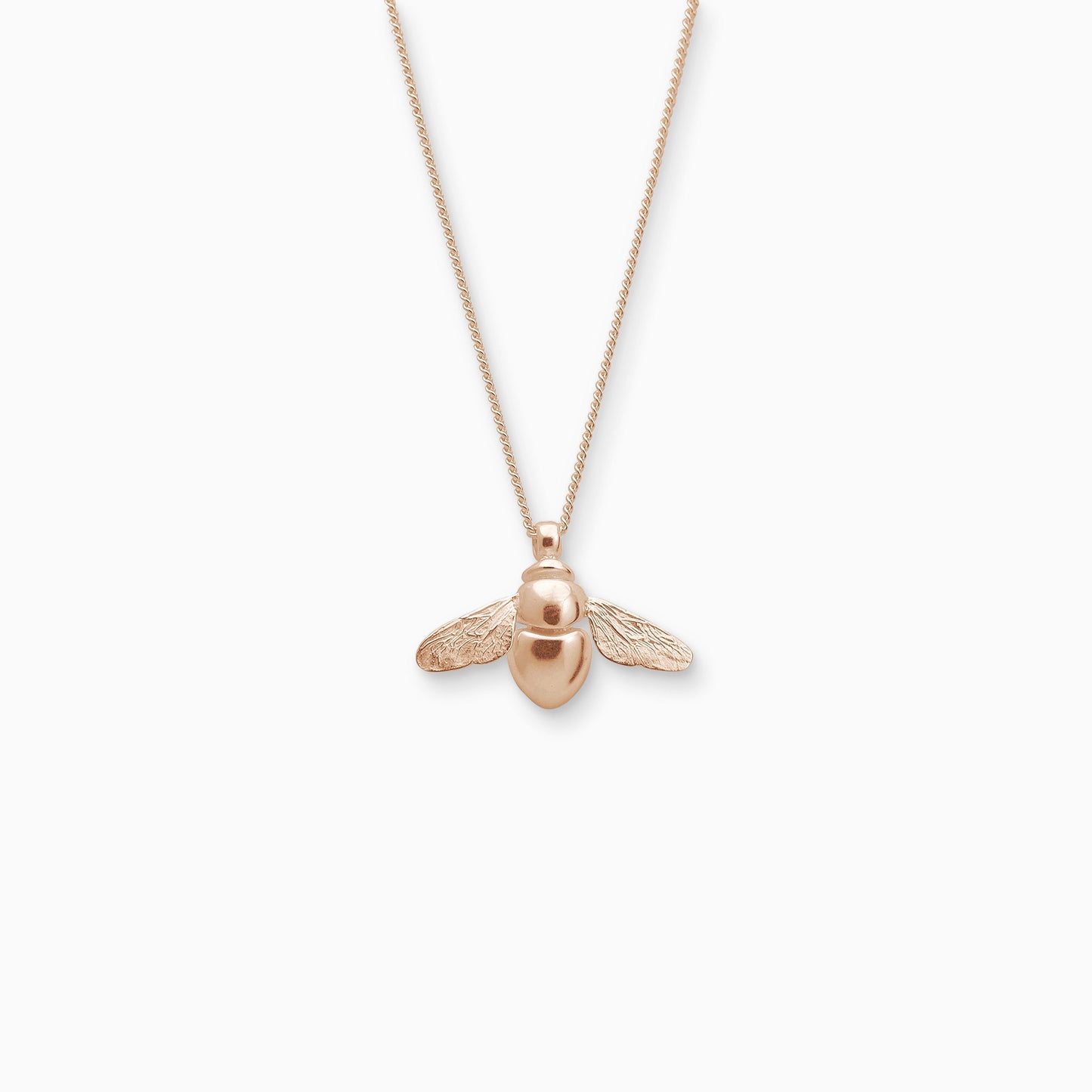 18ct Fairtrade rose gold pendant in the exact form of a Bumble Bee. 22mm x 28mm on a 45cm fine curb chain. The body of the Bee is smooth and shiny and the wings are textured with veins.