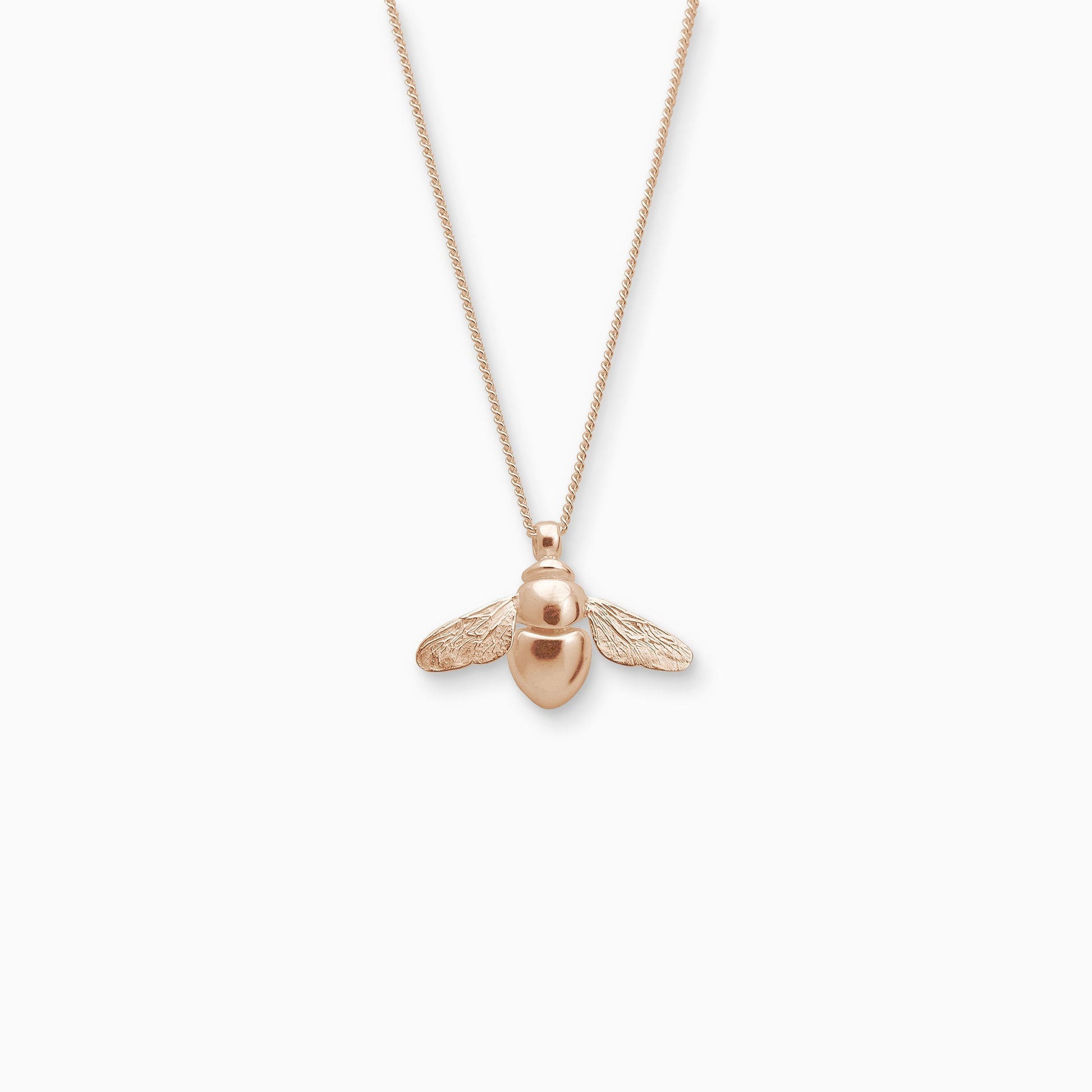 18ct Fairtrade rose gold pendant in the exact form of a Bumble Bee. 22mm x 28mm on a 45cm fine curb chain. The body of the Bee is smooth and shiny and the wings are textured with veins.