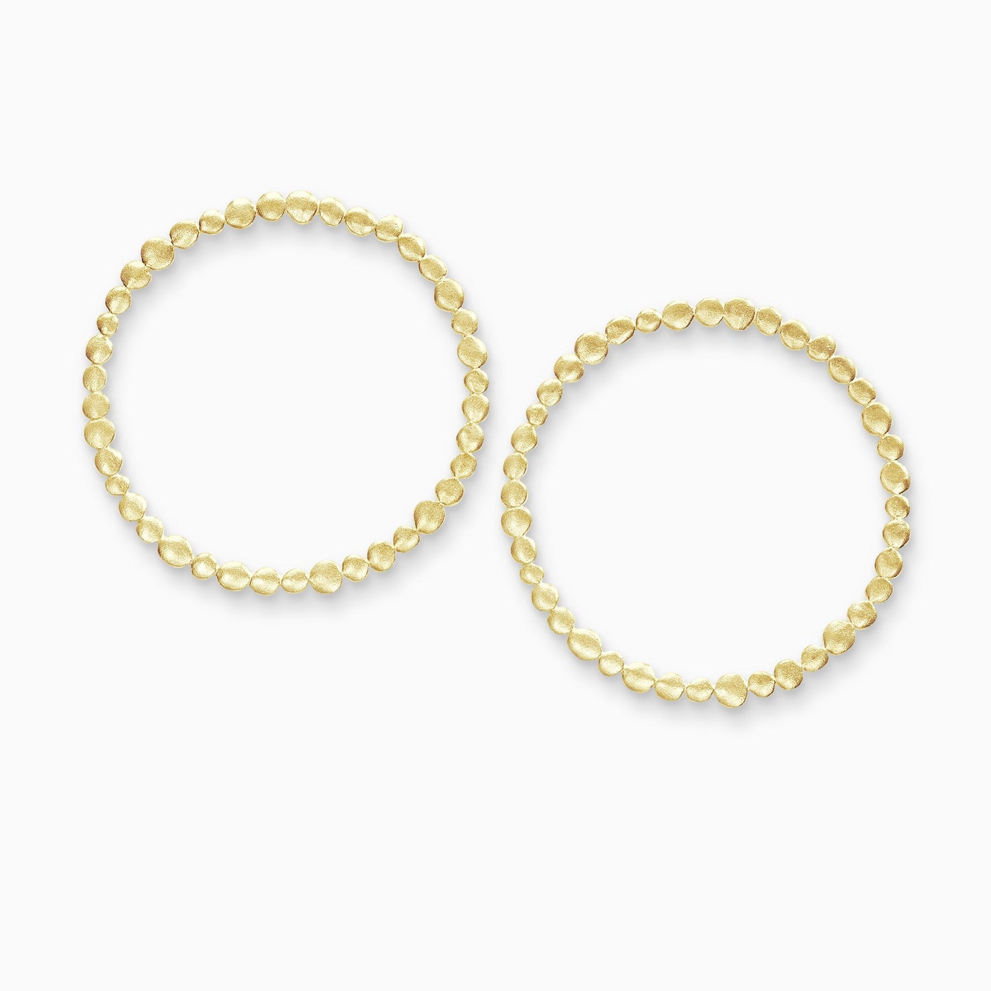 A pair of 18ct Fairtrade yellow gold earrings made of tiny undulating textured and connected dots forming a closed circle. 60mm outside diameter 