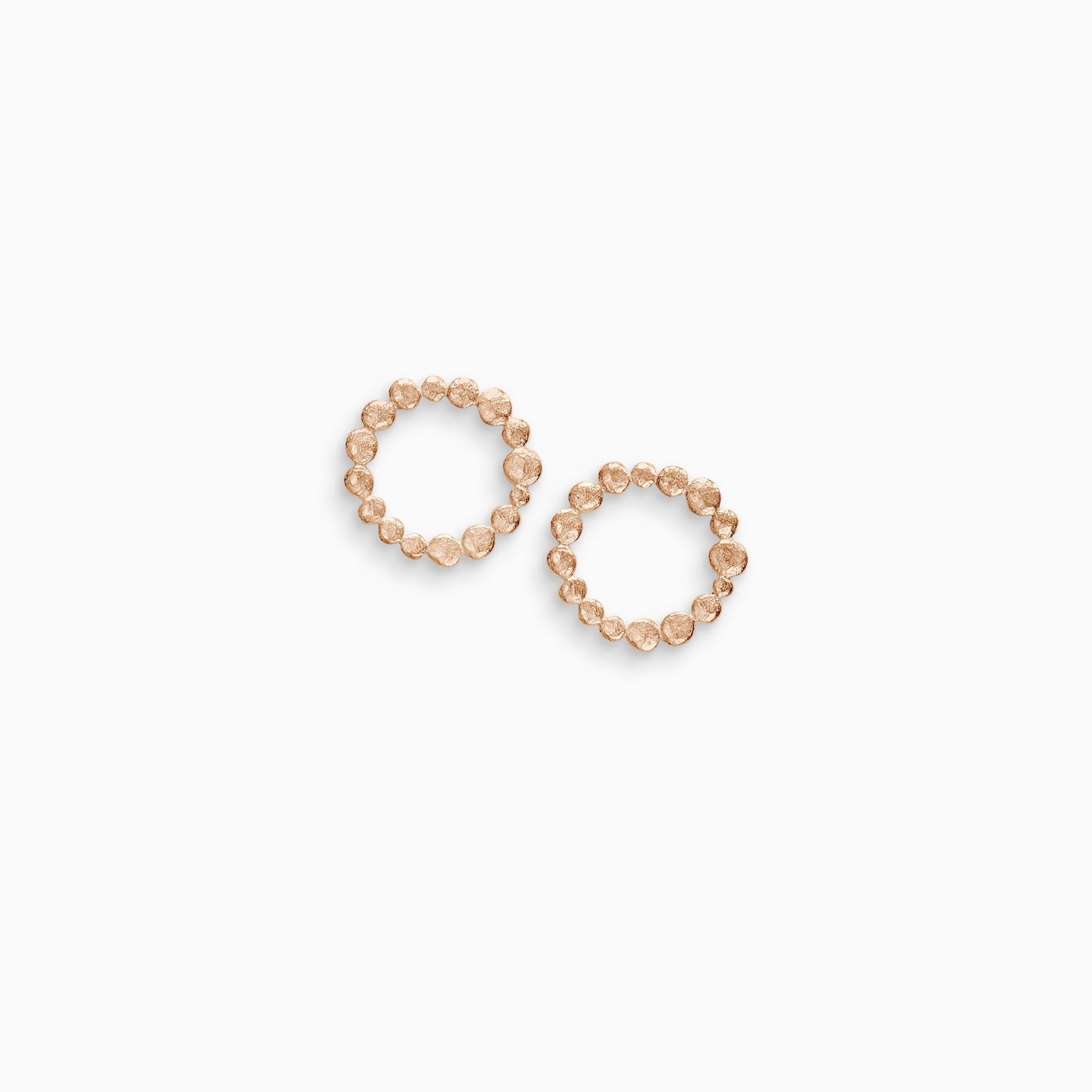 A pair of 18ct Fairtrade rose gold small earrings made of tiny undulating textured and connected dots forming a closed circle. 25mm outside diameter 