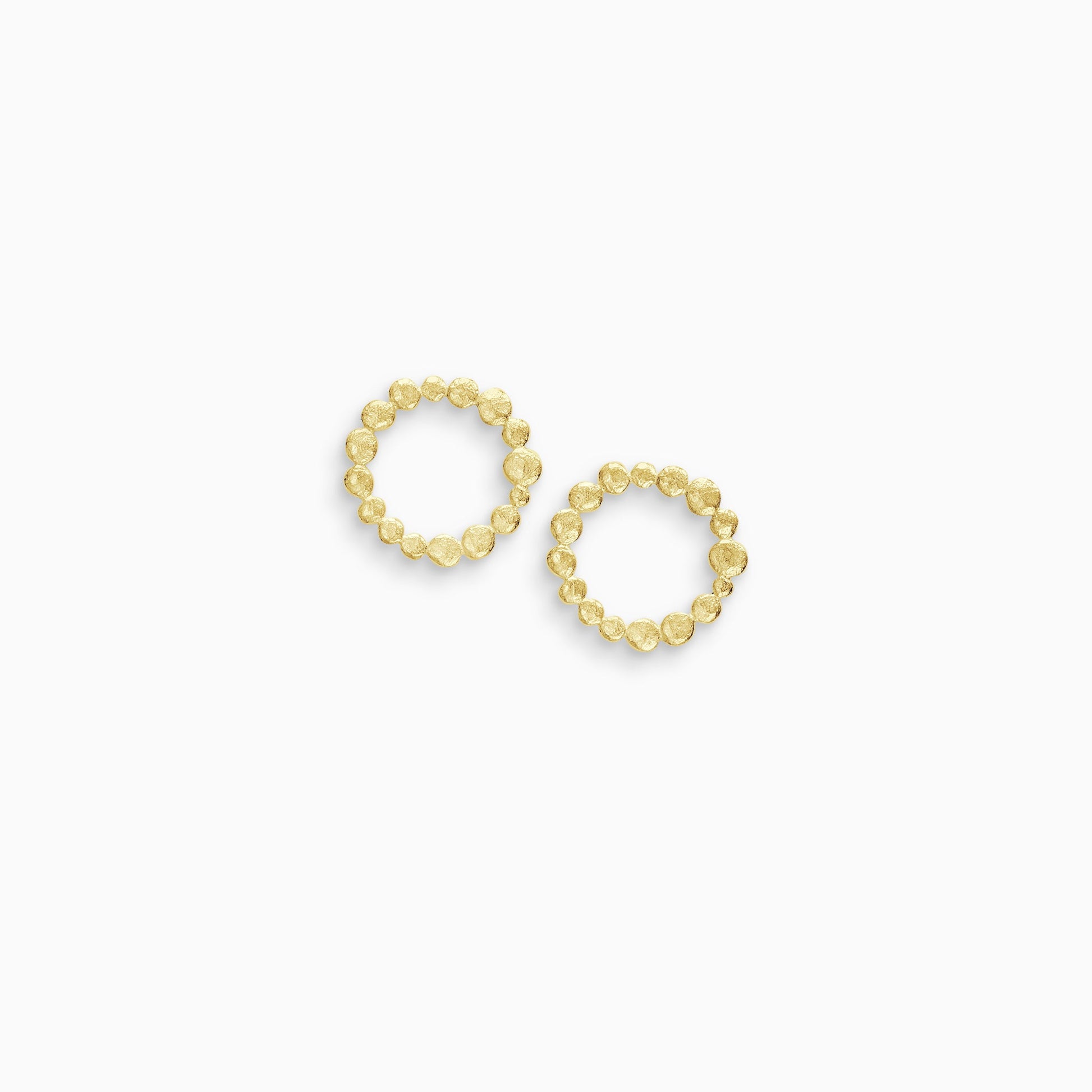 A pair of 18ct Fairtrade yellow gold small earrings made of tiny undulating textured and connected dots forming a closed circle. 25mm outside diameter 