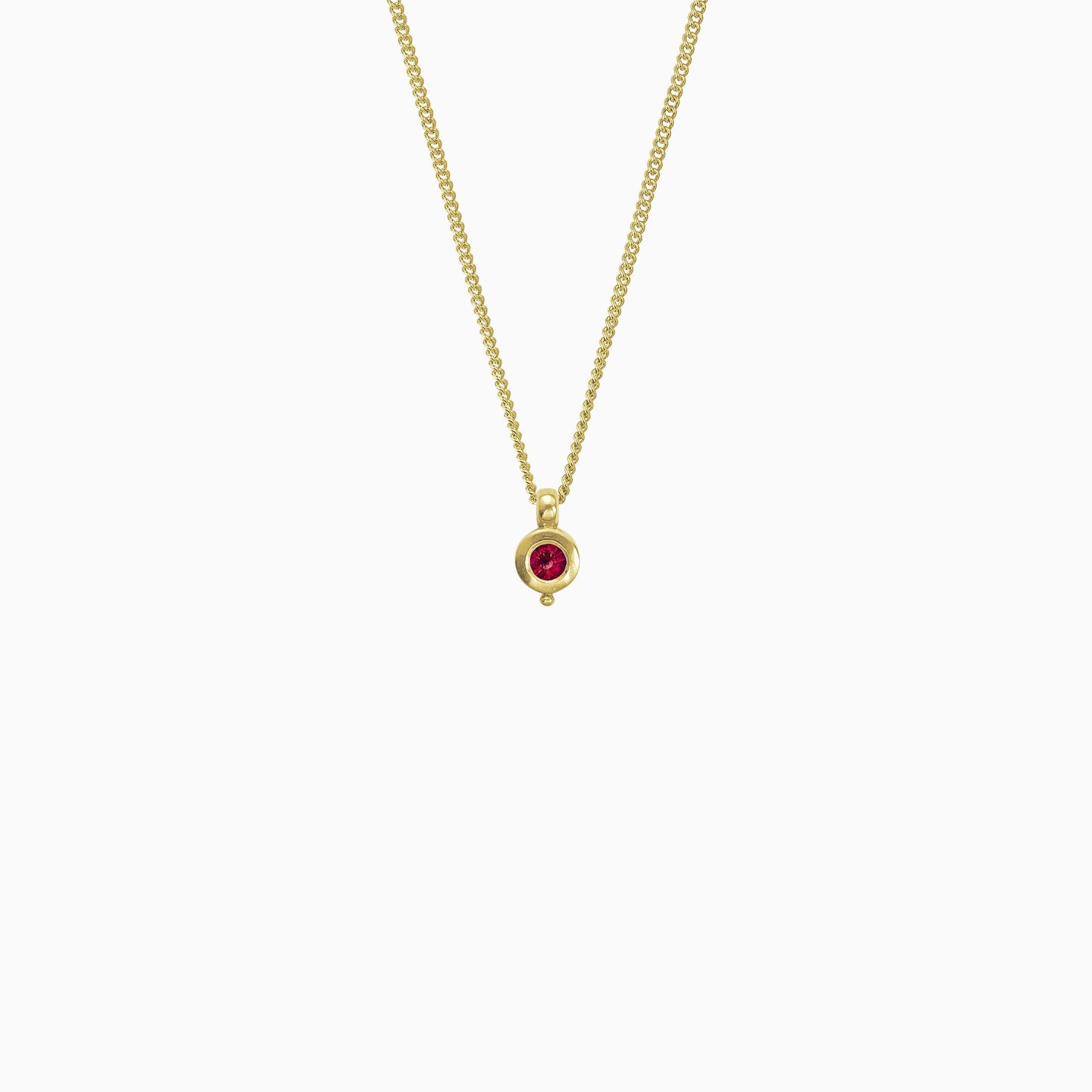 18ct Fairtrade yellow gold round pendant 12mm  x 7mm with small round bead attached below on a 45cm fine curb chain. Set with a 4mm round ruby.
