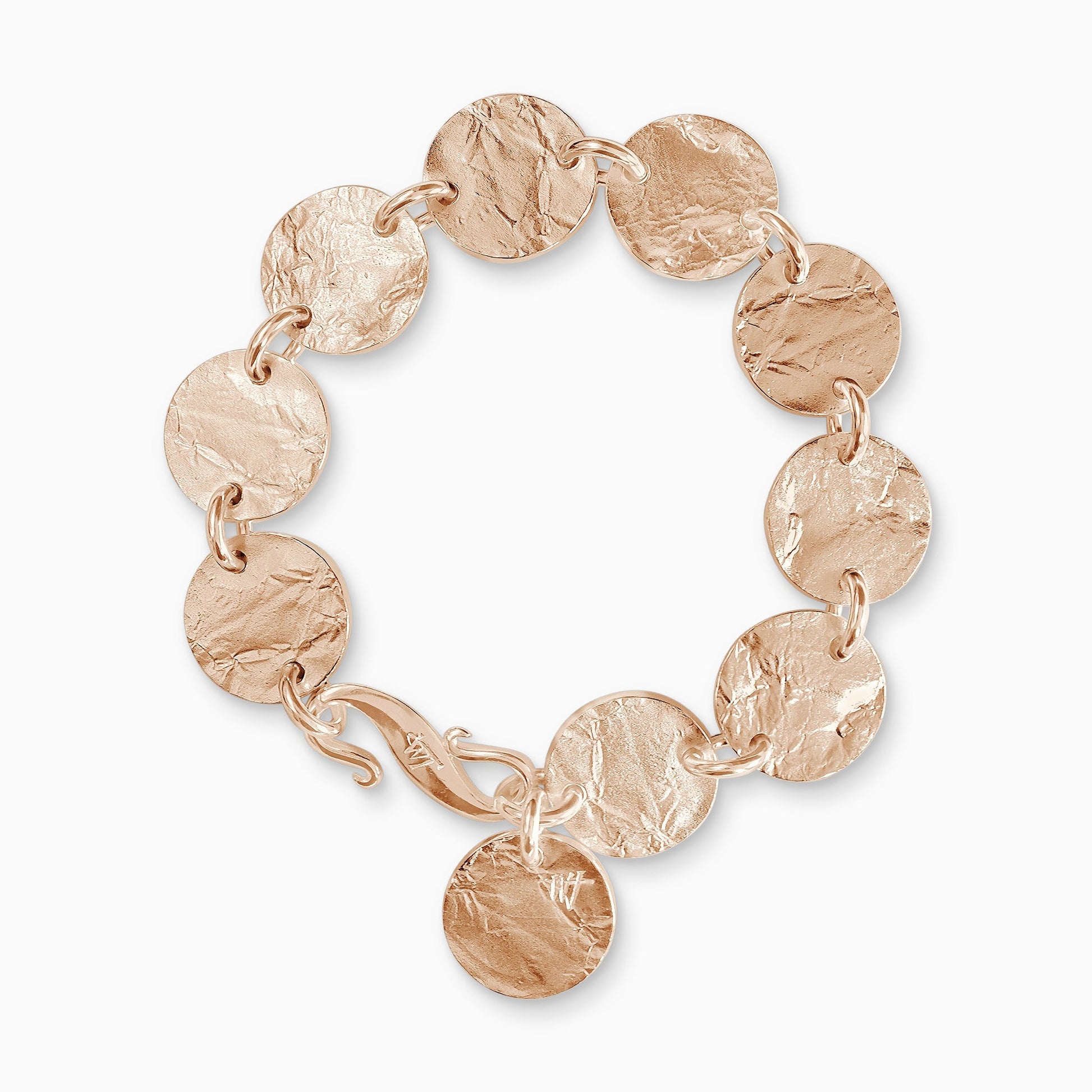 An 18ct Fairtrade rose gold bracelet of 9 linked textured discs with a 10th suspended near the large ’S’ clasp. Discs 17mm diameter. Bracelet length 190mm.