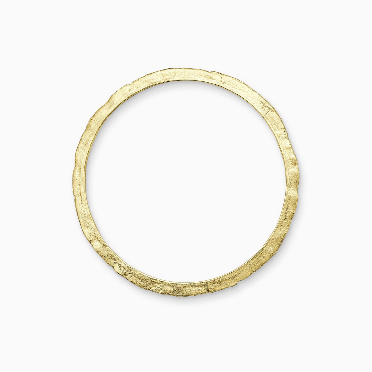 An 18ct Fairtrade yellow gold bangle, textured and flat with smooth inside edge and contoured outer edge. Inside diameter 63mm. Outside diameter 72mm.