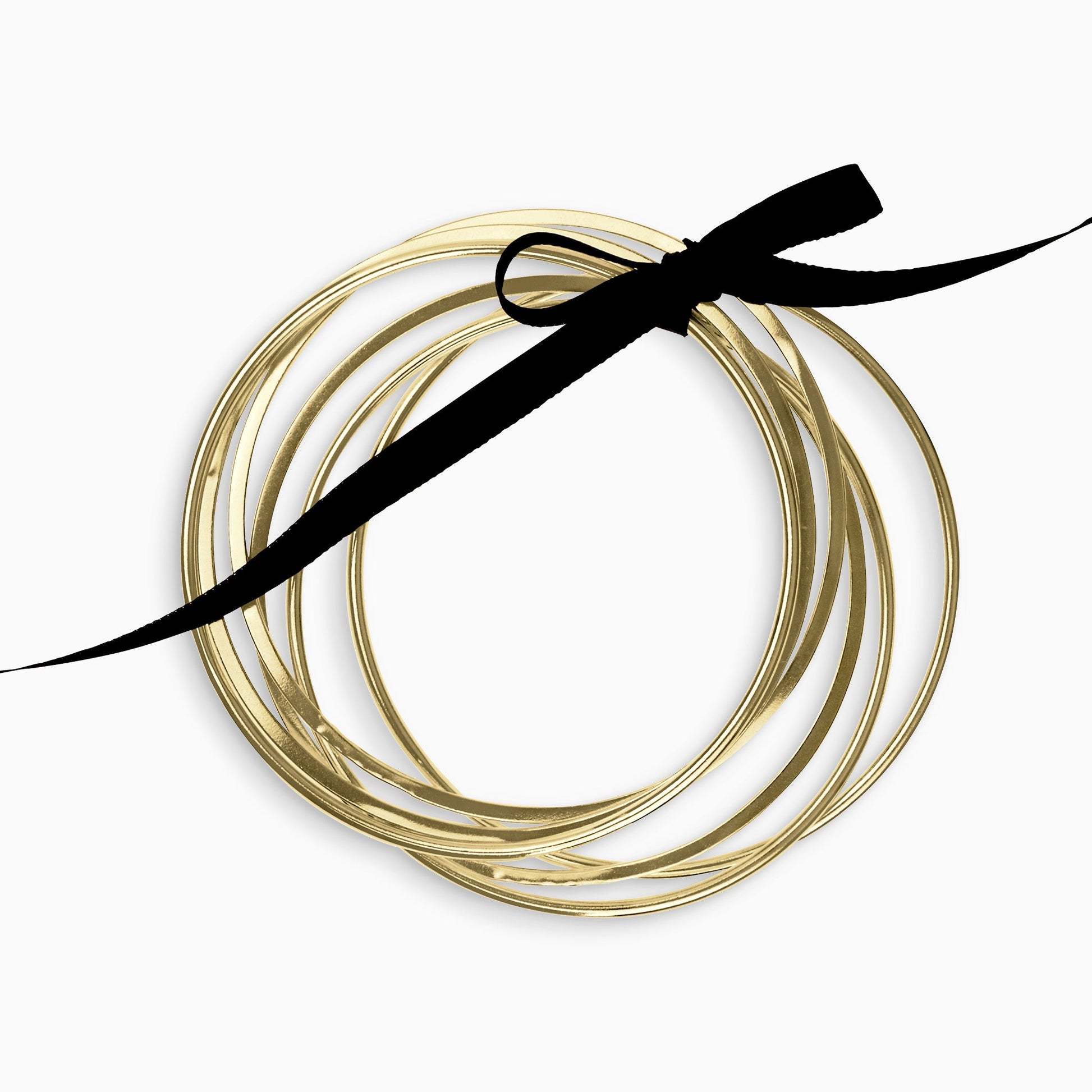 A set of 6 18ct Fairtrade yellow gold bangles of 2mm wire, 3 x round undulating section and 3 x square undulating section. 63mm inside diameter.
