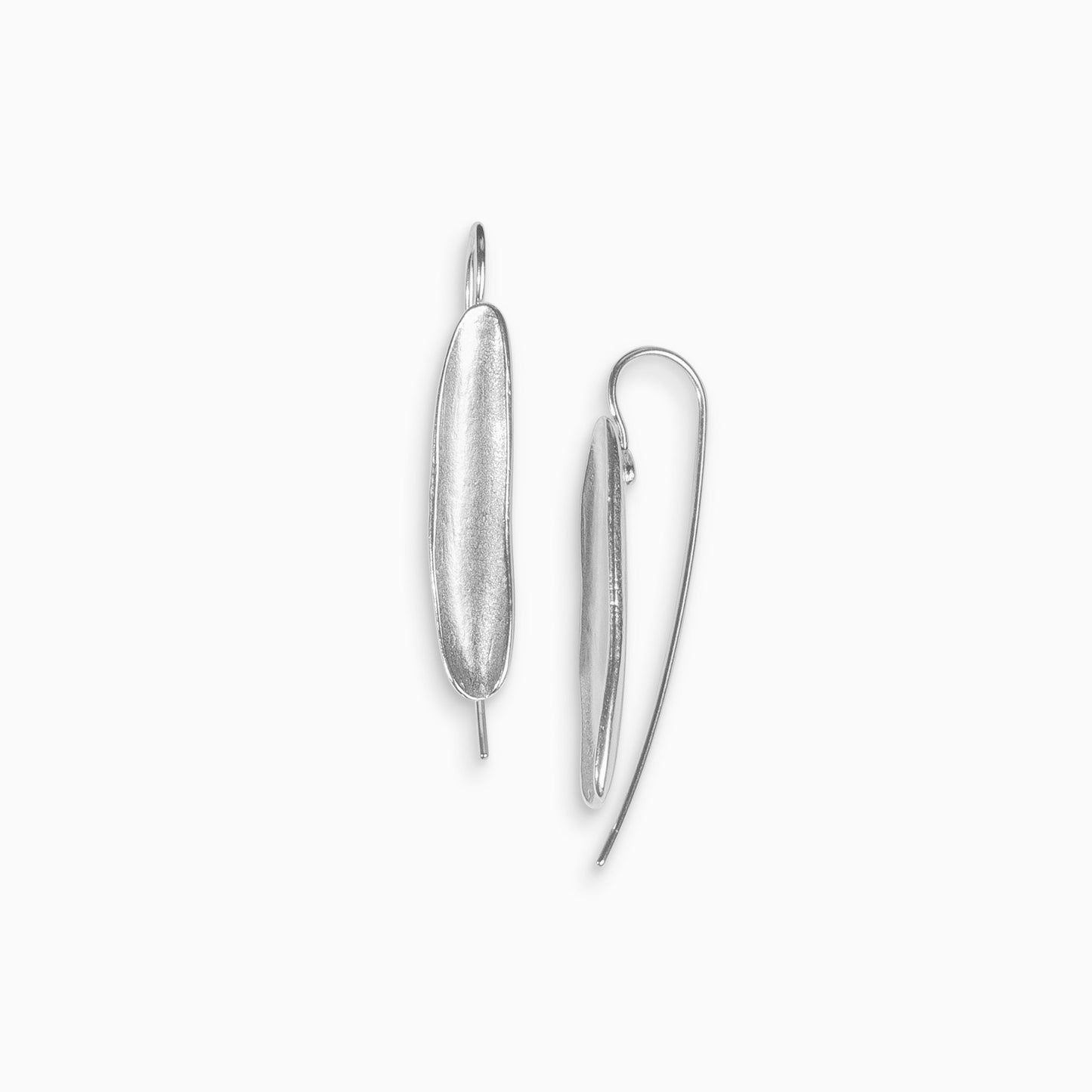 A pair of Recycled silver concave long oval shaped earrings with a hook fastening. Satin finish. 35mm length, 6mm width