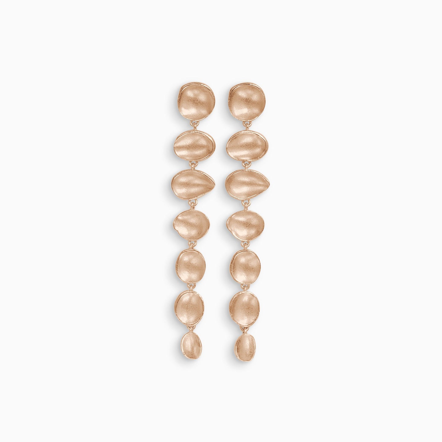 A pair of 18ct Fairtrade rose gold drop earrings. A line of 7 articulating concave discs of various organic shapes and sizes with a stud ear fastening on the top disc. Satin finish. 70mm length, 10mm width.