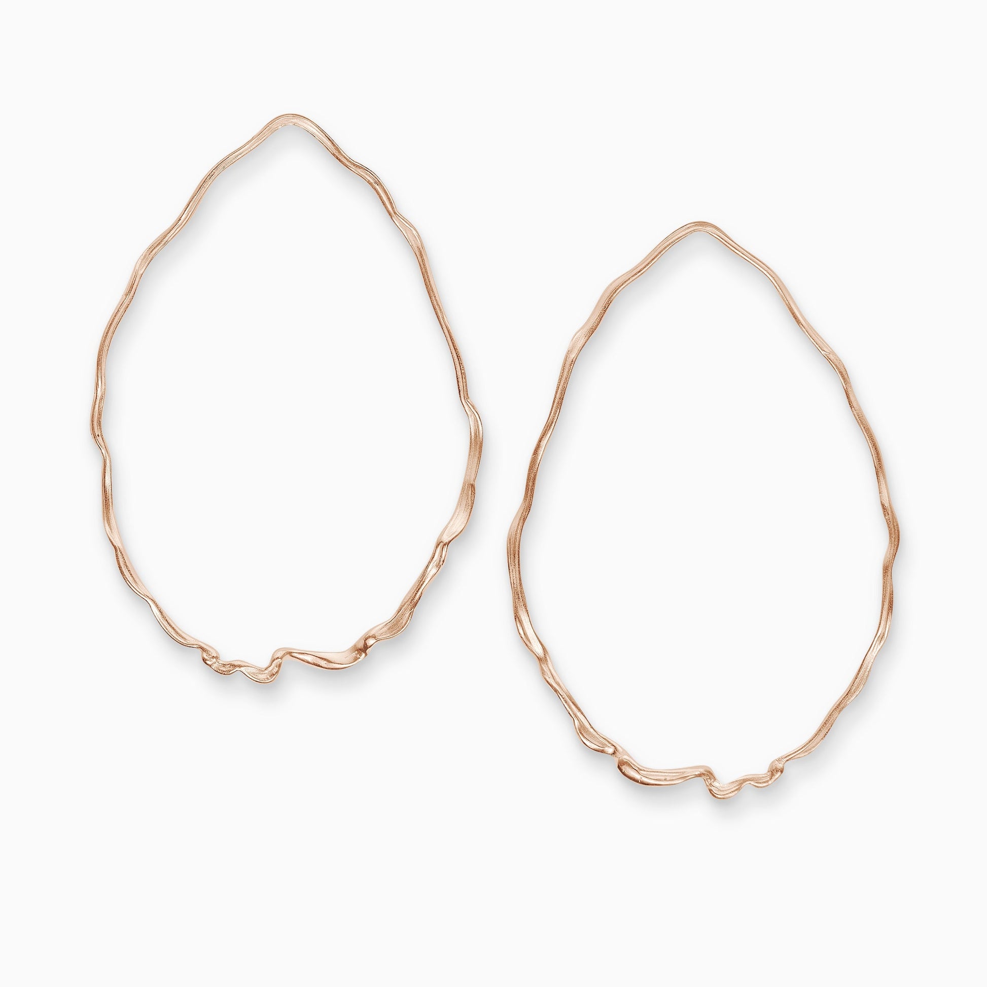 A pair of 18ct Fairtrade rose gold large teardrop shaped earrings with a stud fastening. A fine undulating irregular and organically textured wire forms the large teardrop shape. 75mm x 50mm