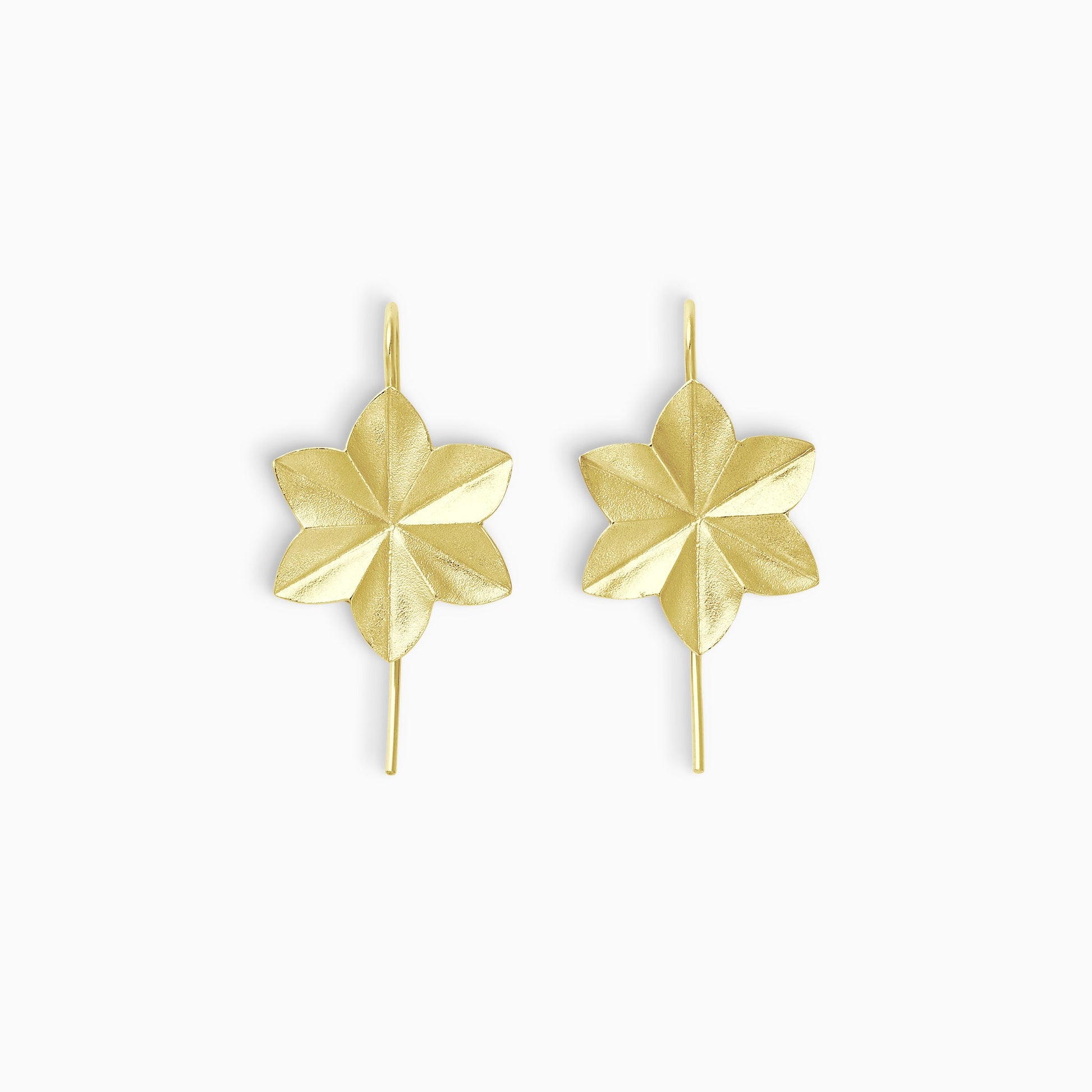 A pair of 18ct Fairtrade yellow gold lightly textured earrings in the shape of an origami folded 6 petal flower with a hook fastening. 38mm length, 18mm width.