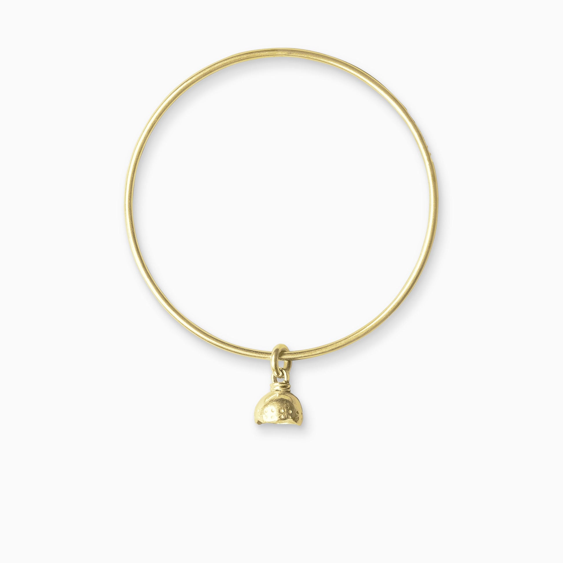 An 18ct Fairtrade yellow gold bell shaped charm freely moving on a round wire bangle. Charm 11mm. Bangle 63mm inside diameter x 2mm round wire.