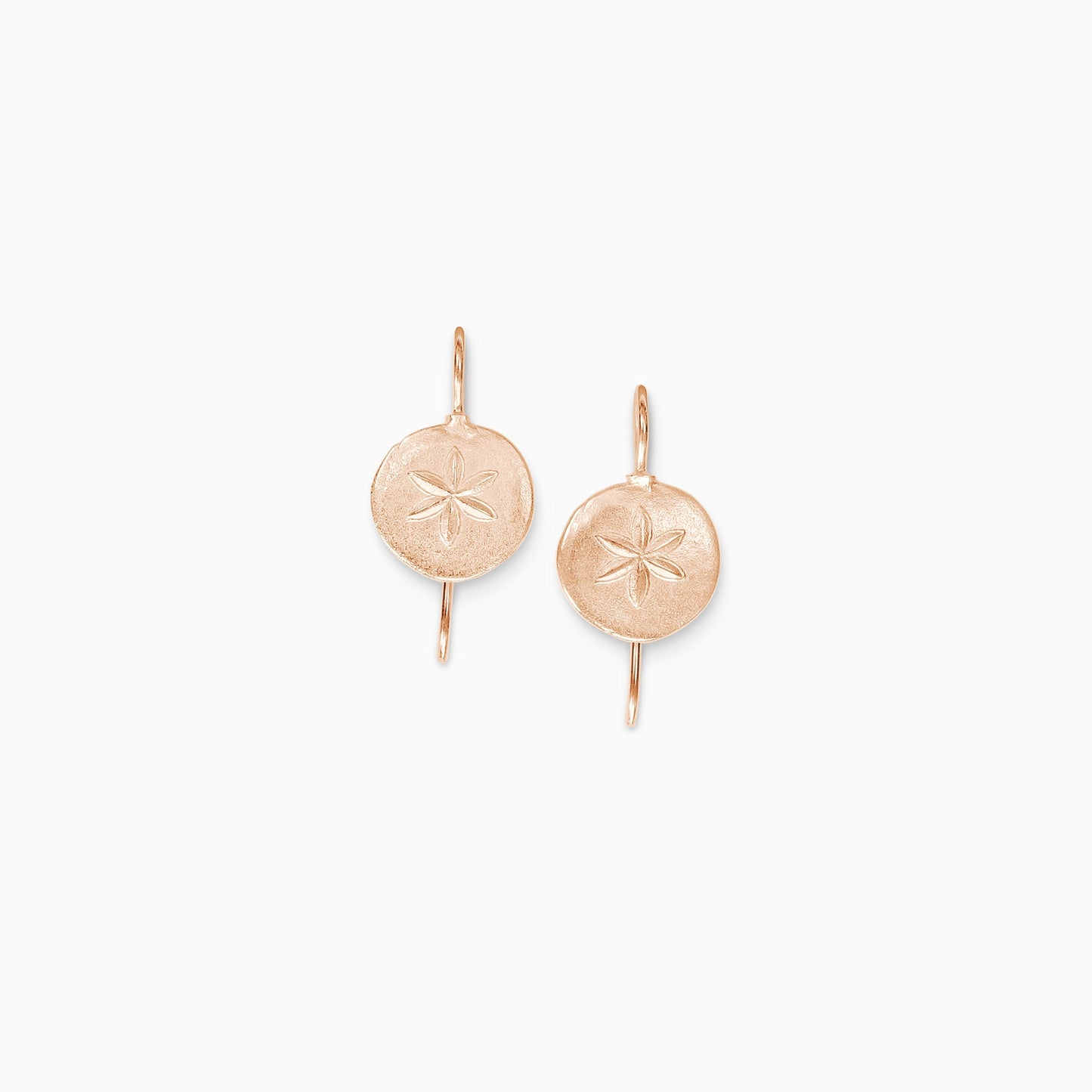 A pair of 18ct Fairtrade rose gold organically circular textured drop earrings .  A six petal flower, similar to a silver dollar is embossed in the centre of the earring which is fastened with a hook. 25mm length, 14mm diameter