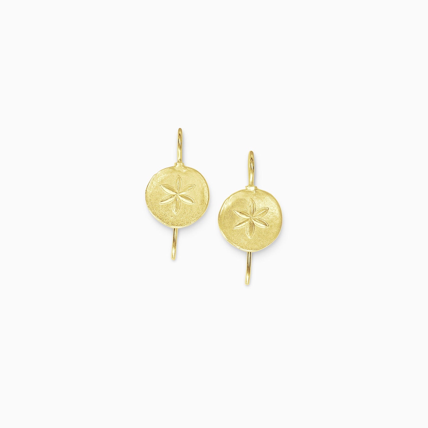 A pair of 18ct Fairtrade yellow gold organically circular textured drop earrings . A six petal flower, similar to a silver dollar is embossed in the centre of the earring which is fastened with a hook. 25mm length, 14mm diameter