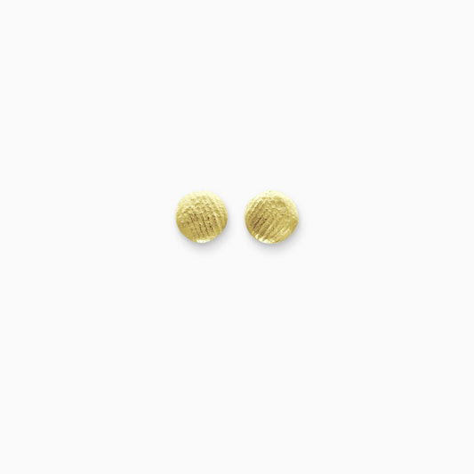 A pair of dainty 18ct Fairtrade yellow gold disc shaped stud earrings. A soft pattern of diagonal lines across a slightly domed surface. 7mm diameter.